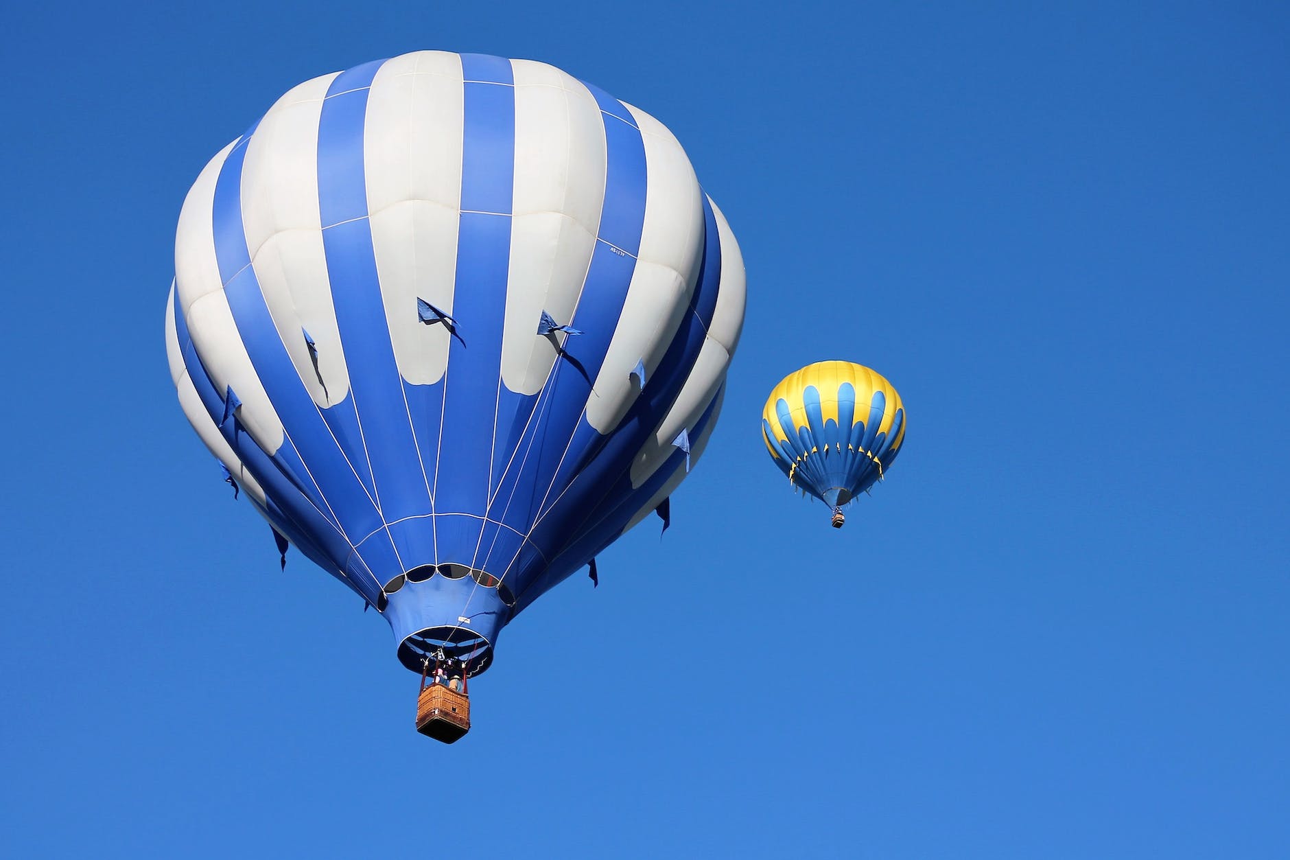 two blue and yellow hot air balloon