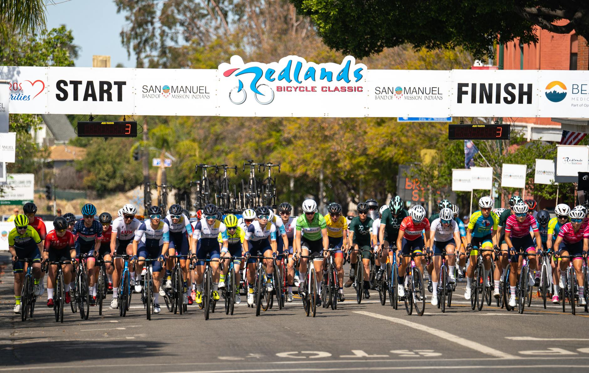 cyclist crossing the start line at a bicycle racing event