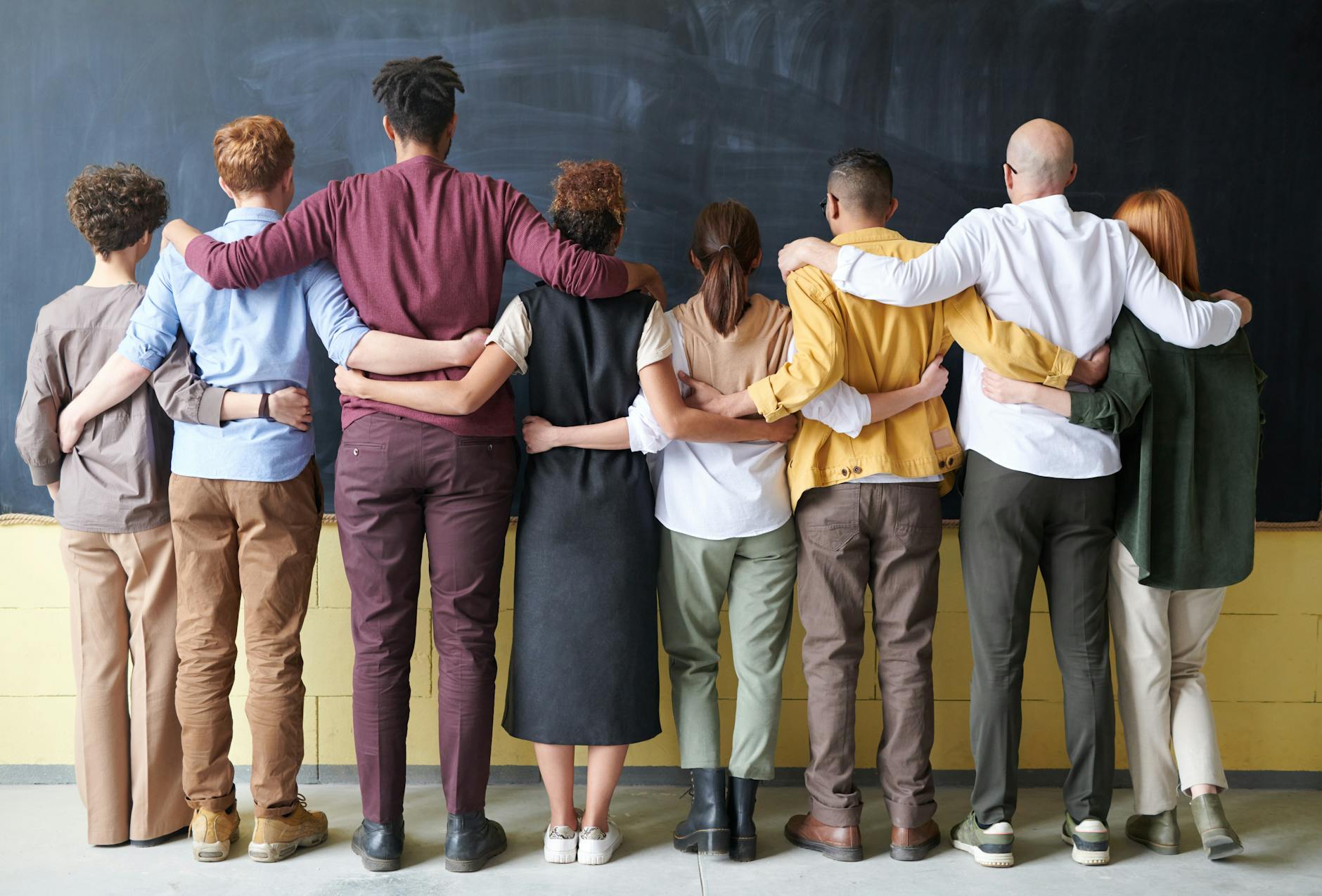 group of people standing indoors