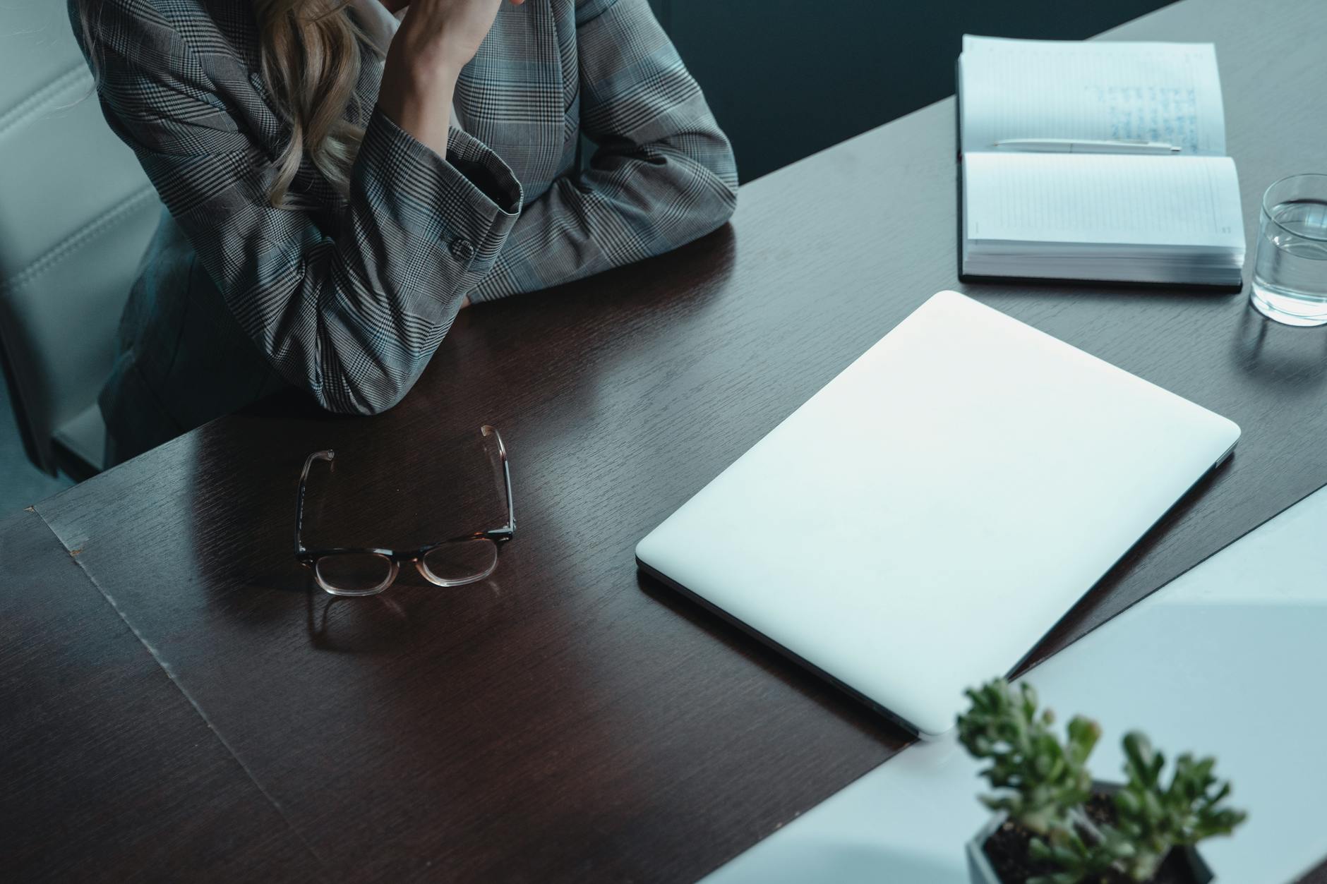 man in gray dress shirt wearing eyeglasses